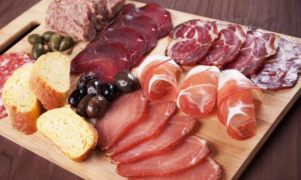 the step-by-step process of crafting basque charcuterie